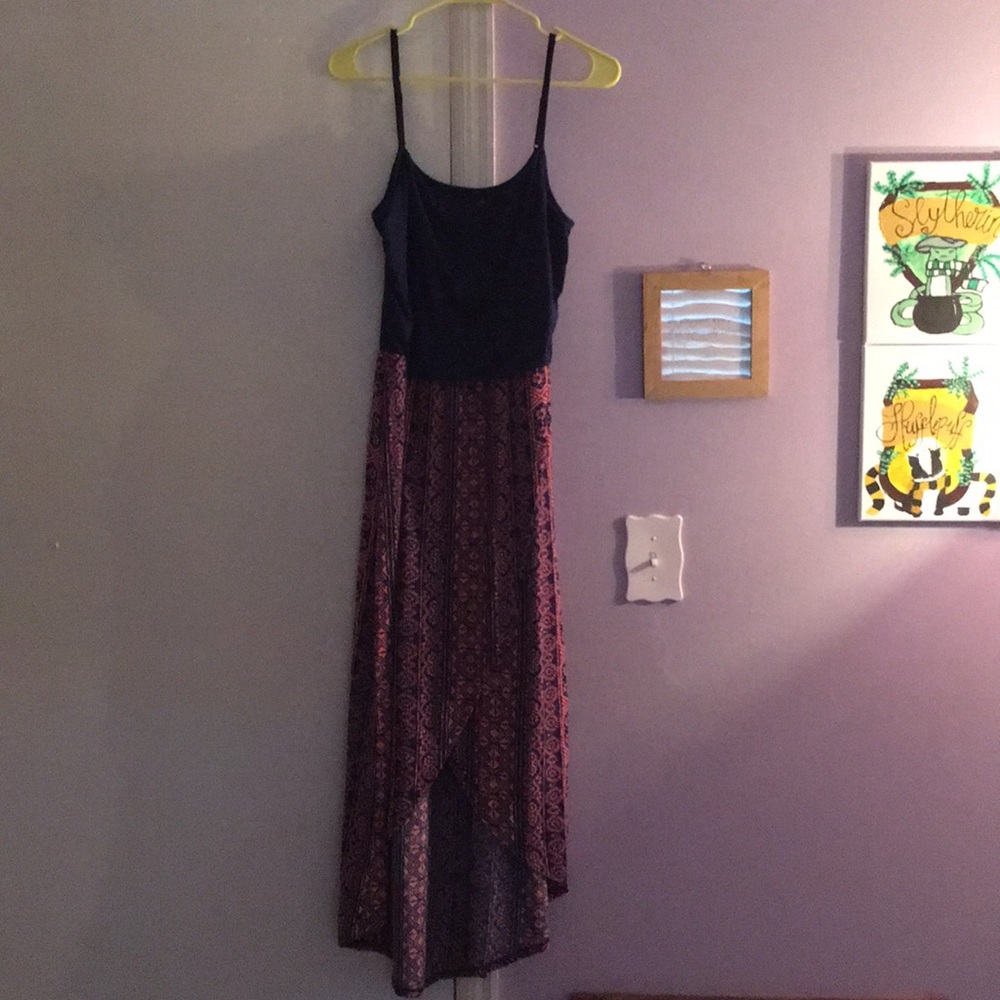 A spaghetti strap dress slit up the middle.